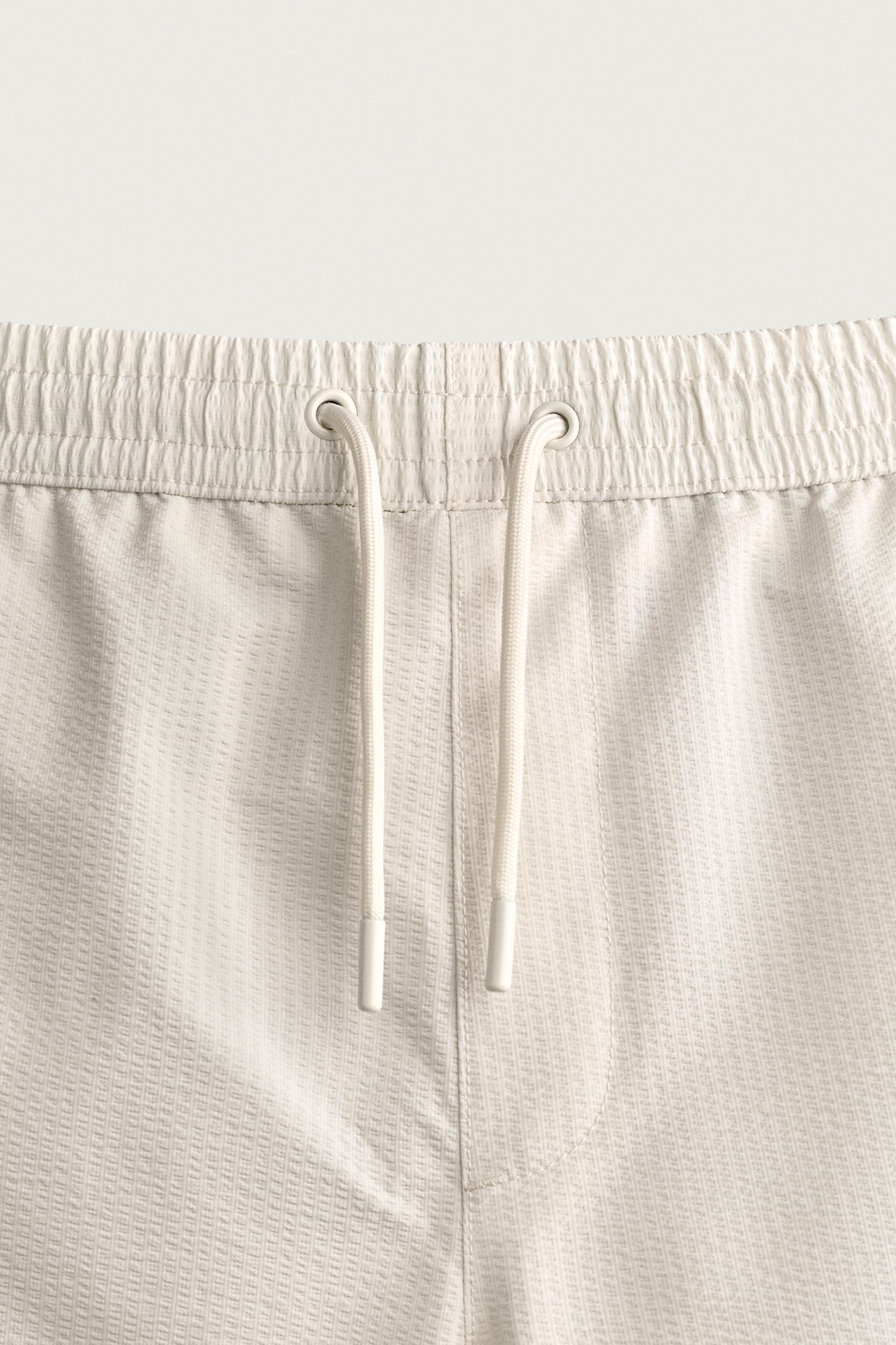 MID-LENGTH SEERSUCKER SWIMSUIT
